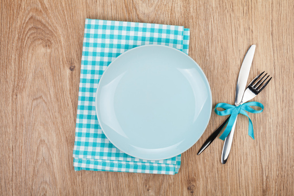 Fork with knife, blank plates and napkin - Photo, Image