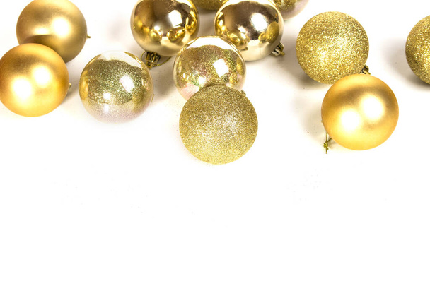 christmas card with gold christmas balls isolated on white background - Foto, afbeelding