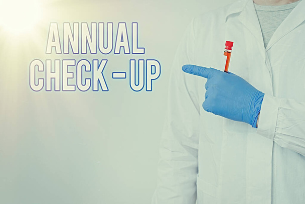 Writing note showing Annual Checkup. Business photo showcasing yearly reproductive health visit with a health care provider Laboratory Blood Test Sample Shown For Medical Diagnostic. - Photo, Image