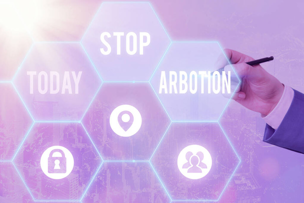 Käsiala tekstin kirjoittaminen Stop Arbotion. Käsitteen merkitys puolustaminen abortin Prolife liikkeen käytäntöjä vastaan Verkot ja kuvakkeiden erilainen käyttöönotto uusimman digitaalisen teknologian käsite. - Valokuva, kuva