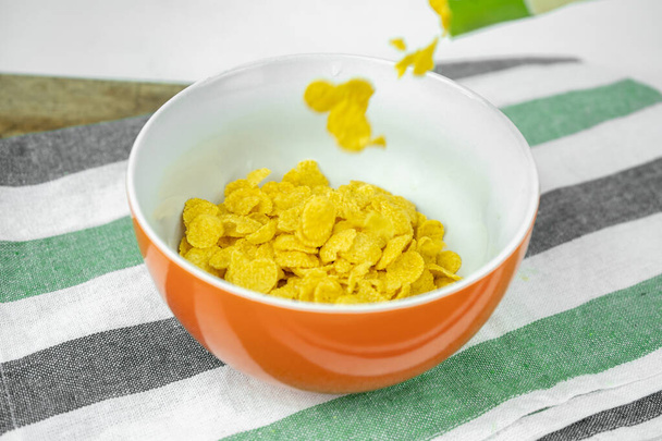 dry cornflakes in a bowl, healthy food - Photo, Image