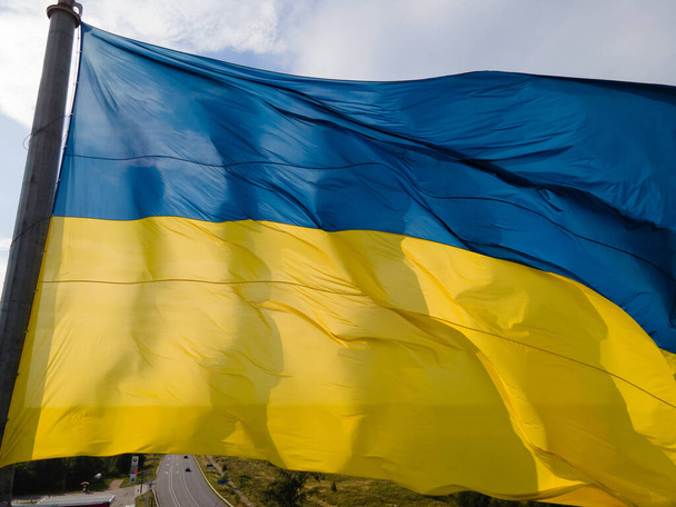 National flag of Ukraine. Kyiv. Aerial view - 写真・画像
