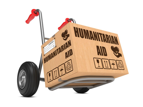 Aiuto umanitario - Scatola di cartone sul camion a mano
. - Foto, immagini