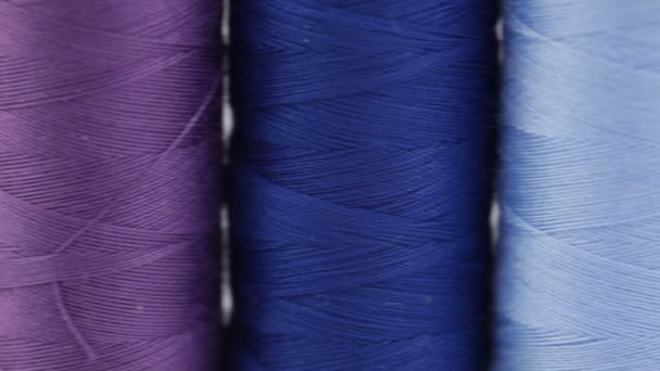 Multicolored sewing threads closeup - Séquence, vidéo