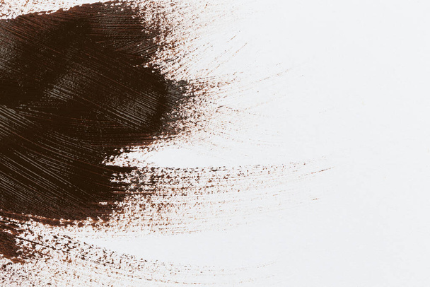Brown stroke of the paint brush on white paper sketch - Fotografie, Obrázek