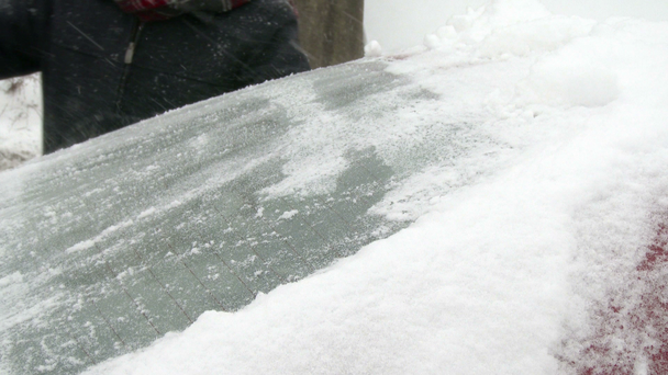 Man Clears Snow Off Car - Footage, Video