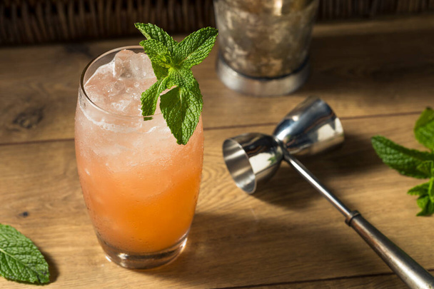 Refreshing Sweet Planters Punch Tiki Cocktail with Mint - Fotó, kép