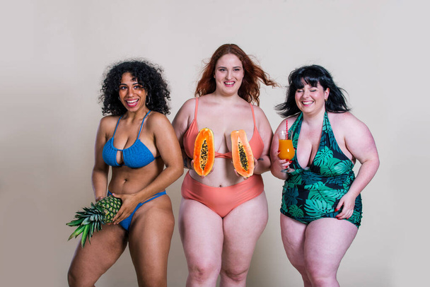 Plus size women making party at the pool - Photo, image