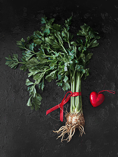 fresh and healthy celery on a dark background - Fotoğraf, Görsel
