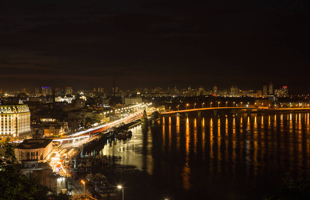 Beautiful View of the Dnieper river, Naberezhno-Kreschatitska street in Kiev, Ukraine. Night panorama of Kyiv - Photo, Image