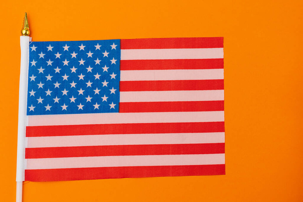 American small flag on colored paper. Abstract background. - Photo, Image