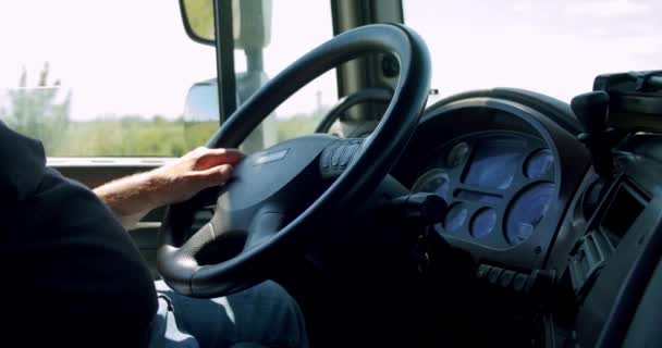 Truck driver View steering wheel with hands for Man driving car at country road on warm summer day. Slow motion Close up - Filmmaterial, Video