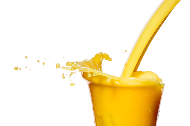 Orange juice splash on a white background - Photo, Image