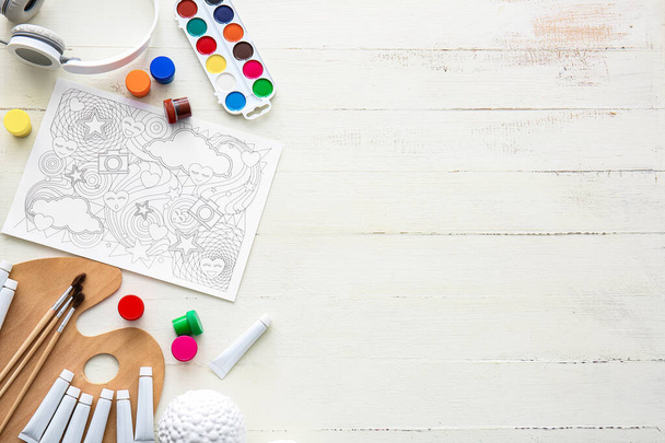 Composition with coloring picture on table - Photo, Image