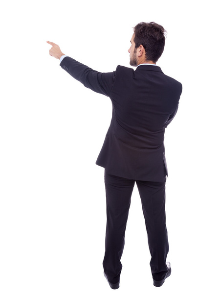 Business man pointing at something, isolated on white backgroun - Photo, Image