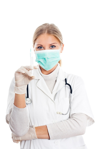 Doctor with protective mask and syringe - Foto, imagen