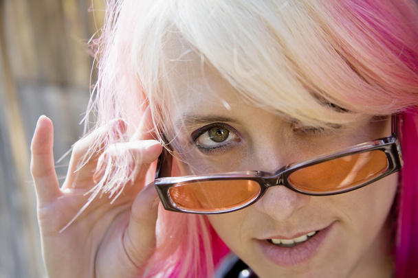Woman Looking Over Her Glasses - Fotoğraf, Görsel