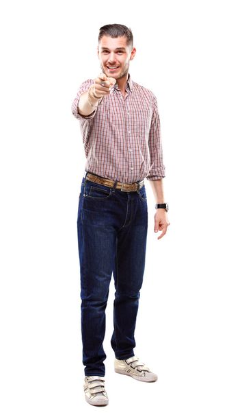 Young business man pointing to the camera on white background - Photo, Image