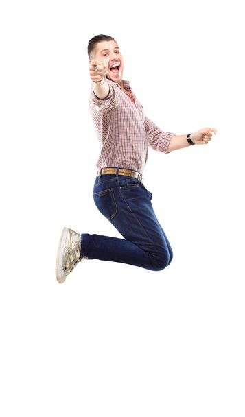Handsome man jumping - Φωτογραφία, εικόνα