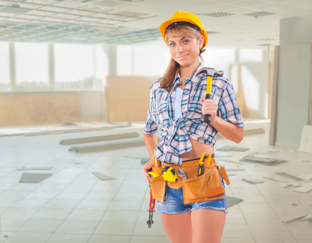 female worker on construction site - Foto, Bild