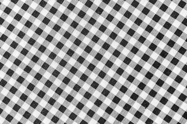 Klassieke zwart-wit geruite stof of tafelkleed achtergrond - Foto, afbeelding