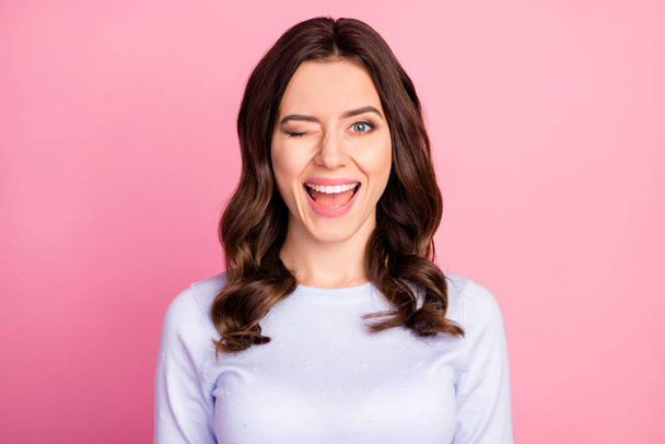 Closeup photo of attractive pretty lady wavy hairdo beaming smiling good mood blinking eye see handsome guy street wear casual white pullover isolated pink color background - Valokuva, kuva