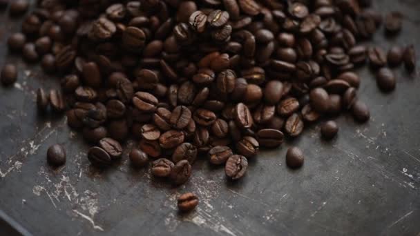 Coffee beans on rustic black background from above.  - Footage, Video