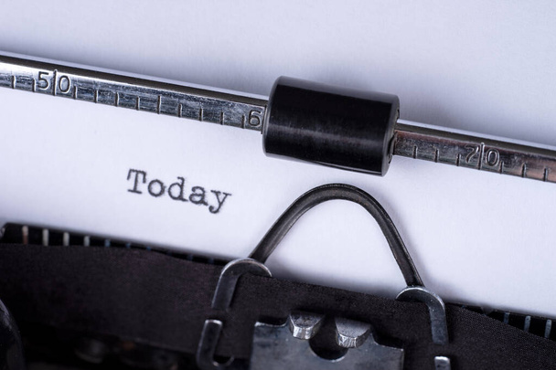 Сьогодні слово, набране на старовинній друкарській машинці
 - Фото, зображення