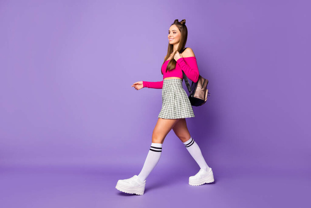 Full length body size view of her she nice attractive lovely pretty charming content cheerful cheery girl going to college isolated on bright vivid shine vibrant lilac violet purple color background - 写真・画像