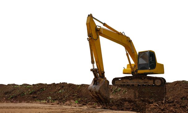 Backhoe working on pile soil isolated on white background with clipping path - Photo, Image