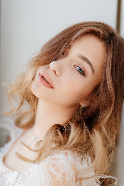 face of beautiful young girl with natural makeup. - 写真・画像