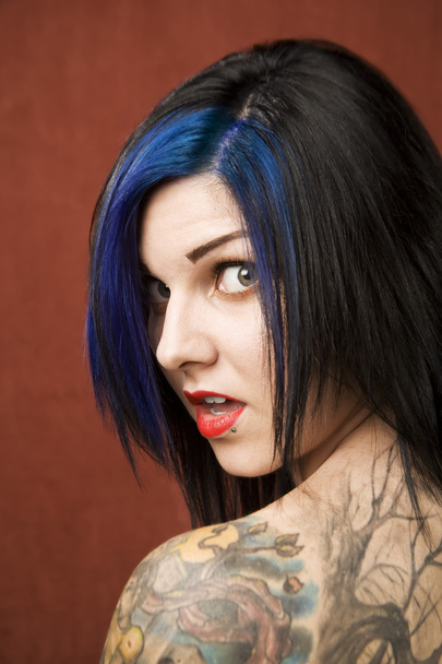 Woman with tattoos - 写真・画像