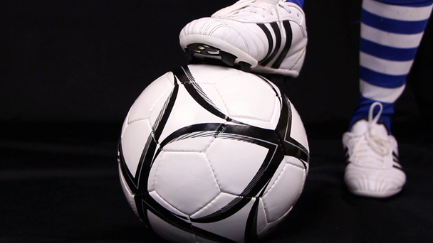 Football, soccer player shoe and ball, close up - Footage, Video