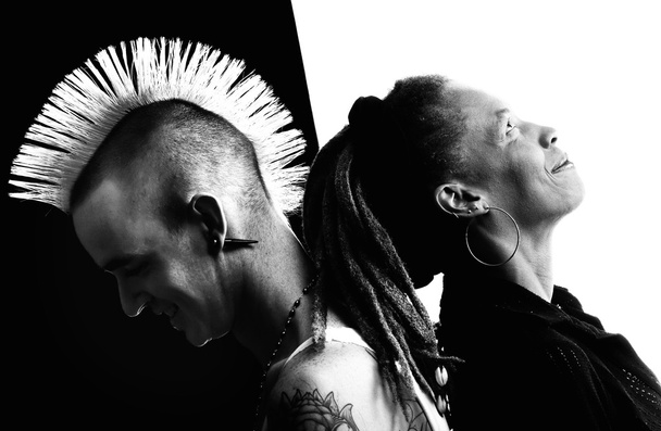 Man with Mohawk and Woman with Dreadlocks - Фото, изображение