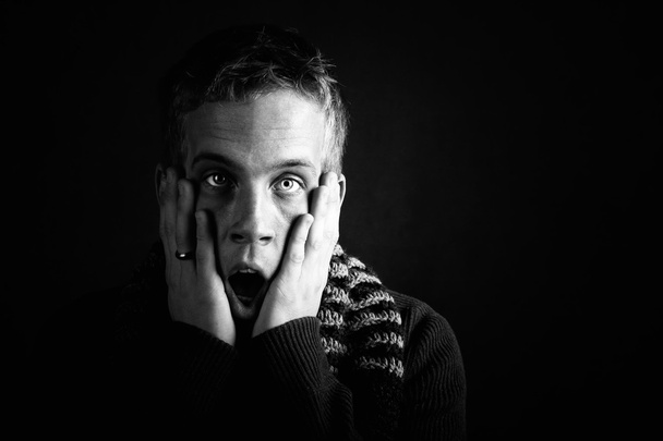 Shocked young man - Foto, afbeelding