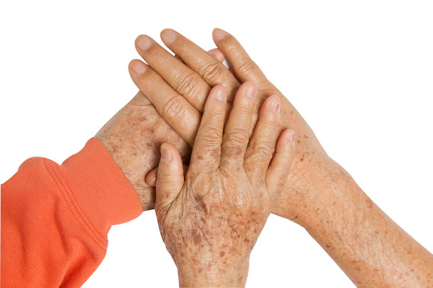 elderly couple holding hands - Photo, Image