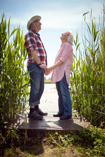 Lovely old couple in love on a sunny day - Foto, imagen