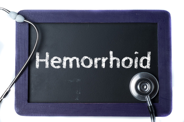 Pizarra con palabra Hemorroides y estetoscopio
 - Foto, Imagen