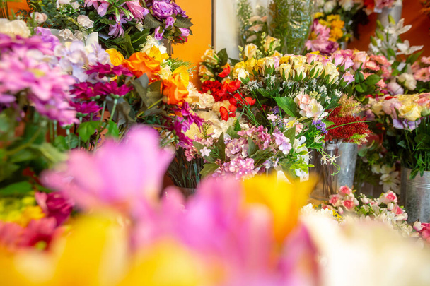 Close up of a huge arrenge of flowers in a flower shop studio - Photo, Image