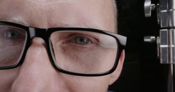 Man wearing eyeglasses and staring - Footage, Video