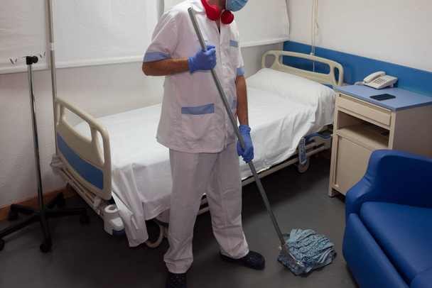 Cleaning staff cleaning hospital rooms - Photo, Image