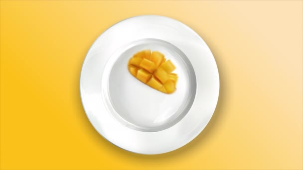 Composition of mango on a white plate. - Filmmaterial, Video