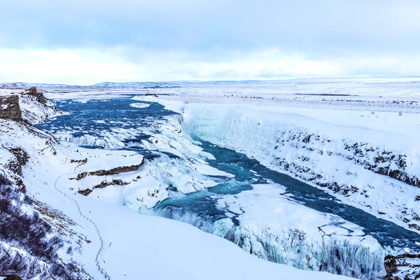 Amazing aereal winter landscape view of Gullfoss waterfall in Iceland. Picturesque winter landscape view of Gullfoss waterfall in Iceland. - Foto, Imagen