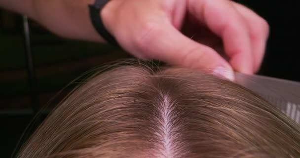 Womans hair being combed - Footage, Video