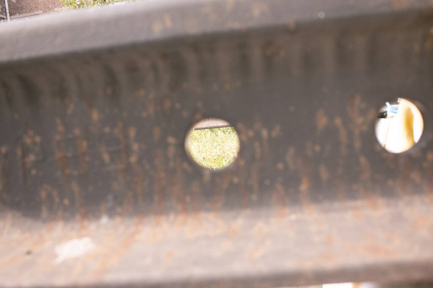 Railway equipment. A hole in a railroad rail. - Photo, Image