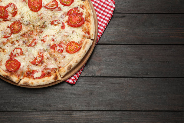 Delicious pizza Margherita on wooden table, top view. Space for text - Photo, Image