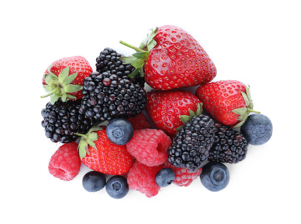 Pile of different ripe tasty berries isolated on white, top view - Valokuva, kuva