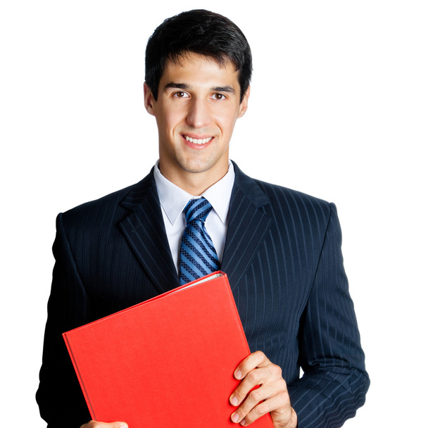 Smiling businessman with red folder, isolated on white - 写真・画像