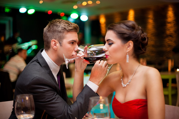 Romantic couple drinking wine - Фото, зображення