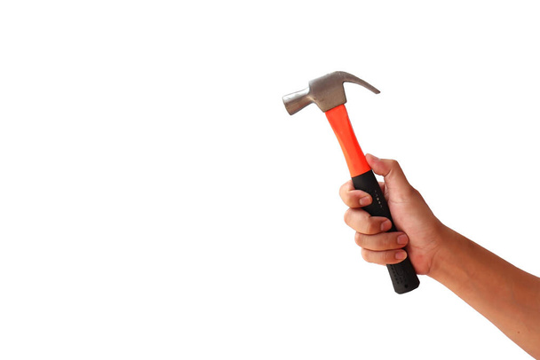 Human hands holding a hammer for repairs, isolated on a white background with the clipping path. - Foto, imagen